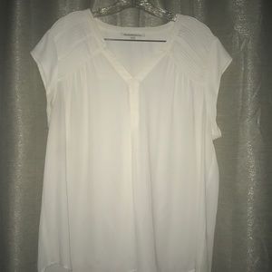 White sleeveless blouse